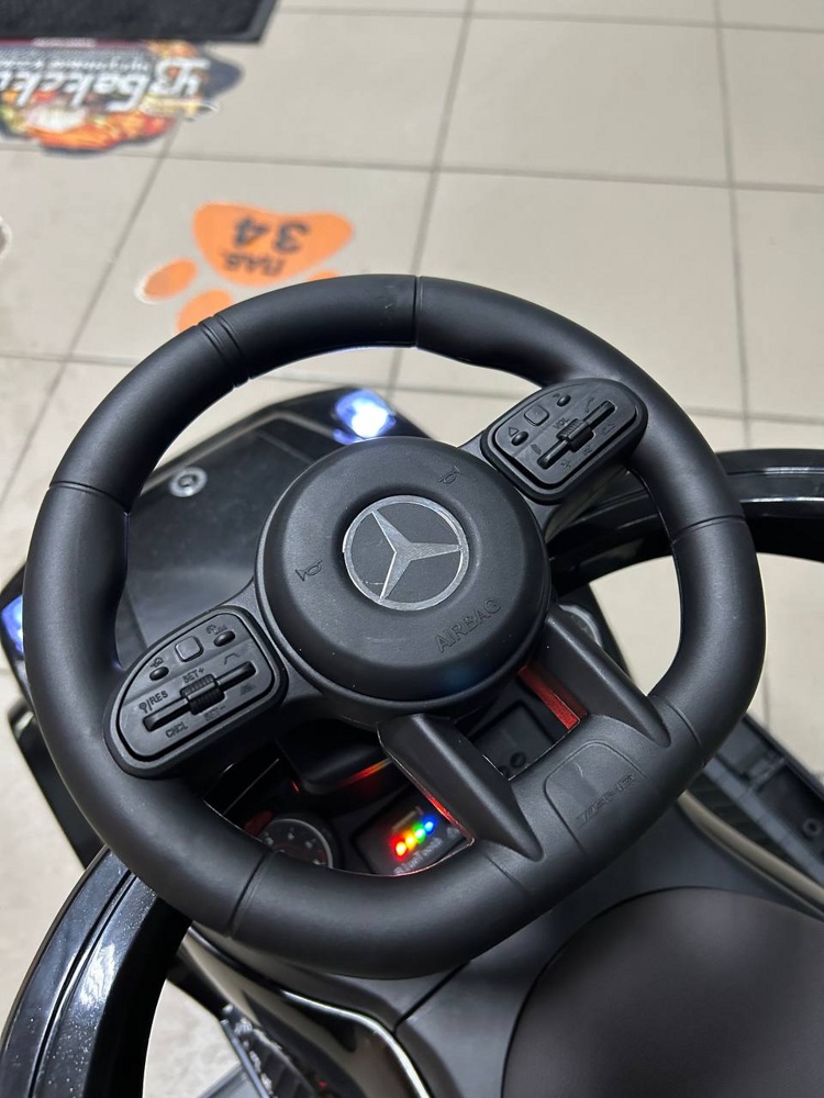 Детский толокар River Toys Mercedes-Benz G63 Z001ZZ-C (черный бриллиант) звук и свет от батареек - фото4