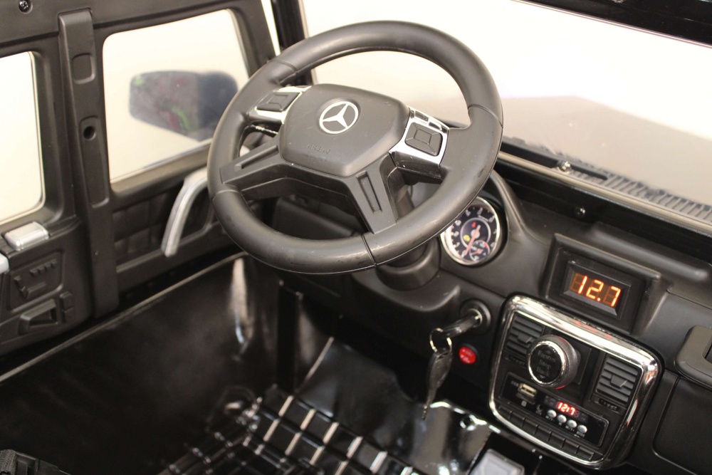 Детский электромобиль RiverToys Mercedes-Benz G63 AMG 4WD X555XX (черный глянец) автокраска лицензия - фото5