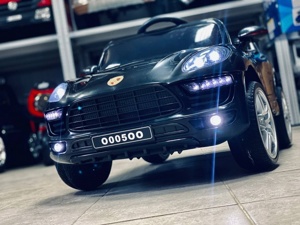 Детский электромобиль RiverToys Porsche Macan O005OO VIP (черный) глянец - фото