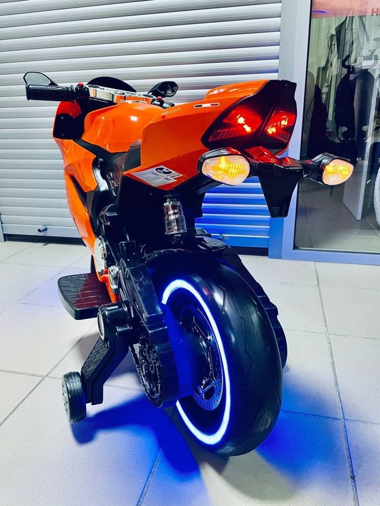 Детский электромобиль, мотоцикл RiverToys A001AA (оранжевый) Ducati  - фото3