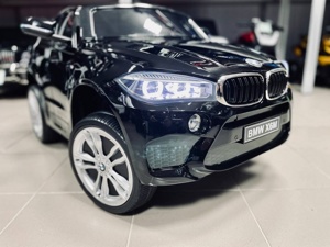 Детский электромобиль RiverToys BMW X6M JJ2199 (черный глянец) лицензия - фото