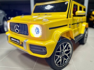 Детский электромобиль RiverToys Mercedes-Benz G63 T999TT (желтый) лицензия - фото