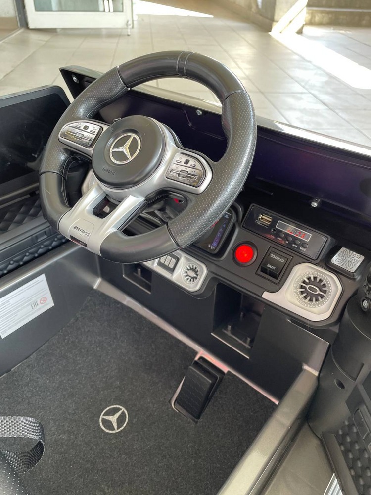 Детский электромобиль RiverToys Mercedes-Benz G63 O111OO (серый глянец) Лицензия - фото4