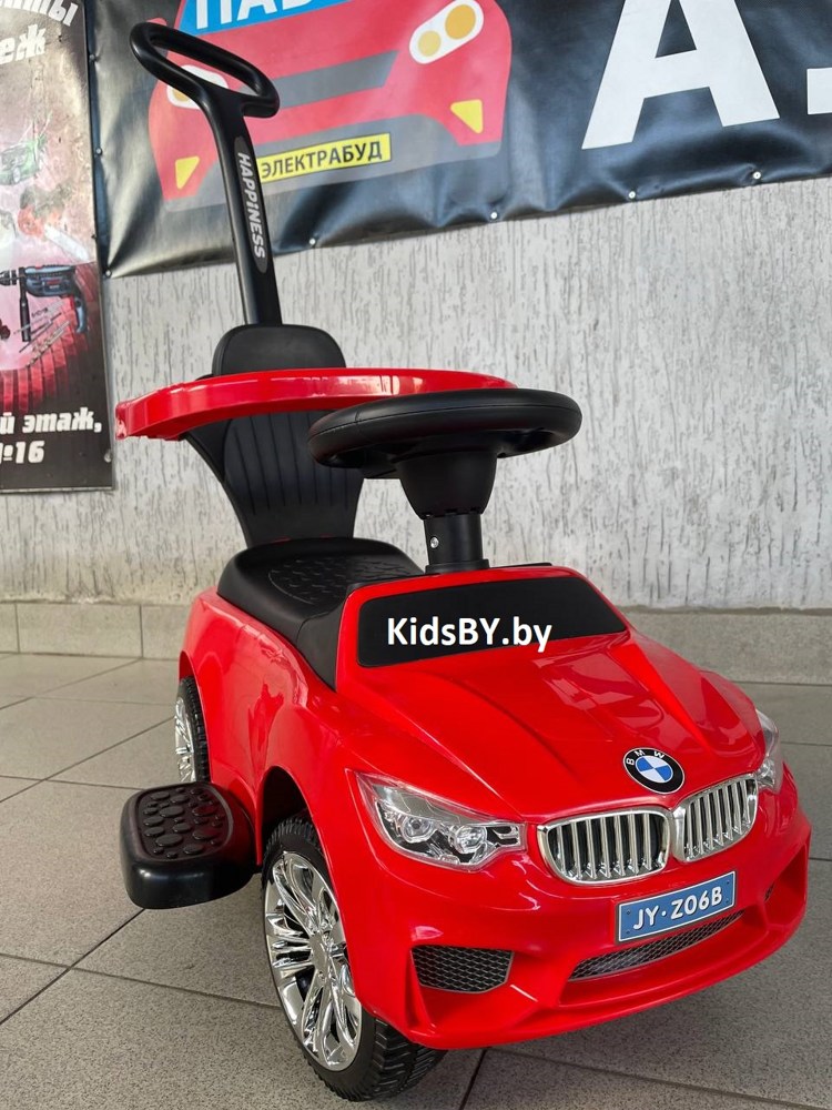 Детская машинка-каталка, толокар RiverToys BMW JY-Z06B (красный/черный) с ручкой-управляшкой