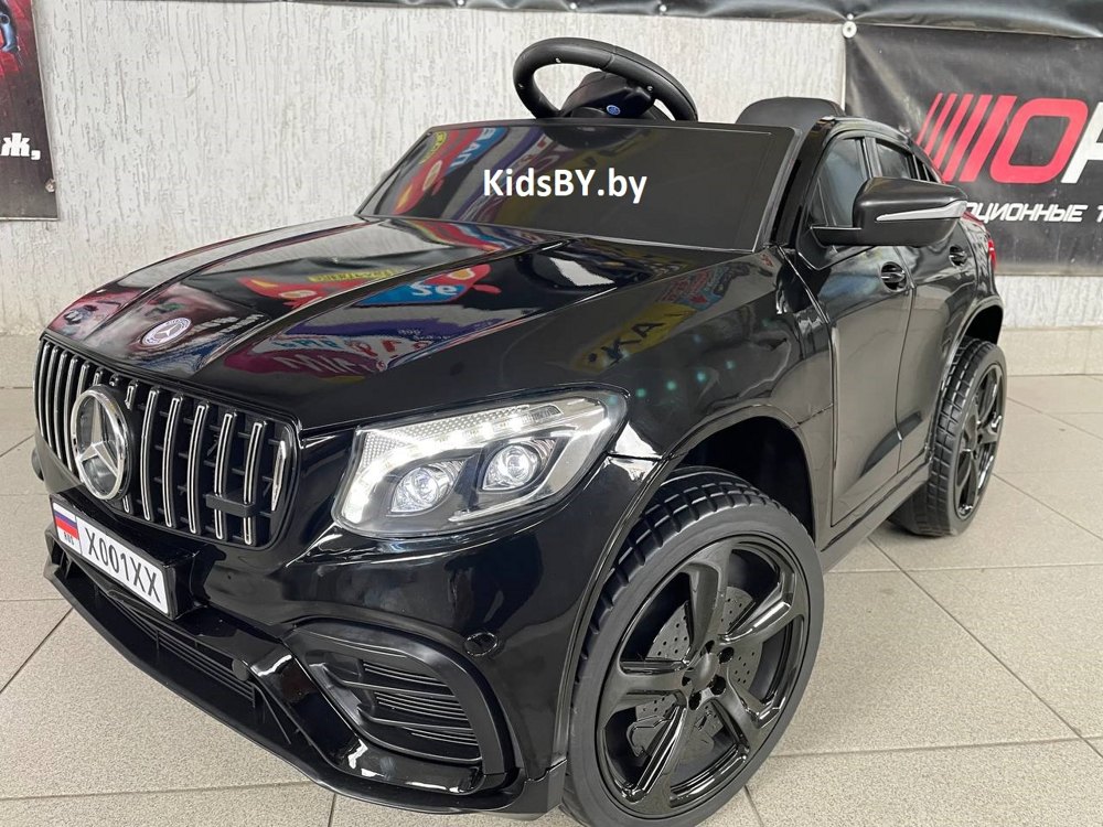 Детский электромобиль RiverToys X001XX (черный глянец) Mercedes Полноприводный