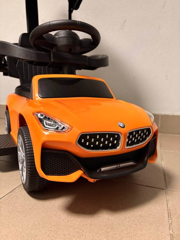 Детский толокар RiverToys Z005ZZ-B (оранжевый) - фото2